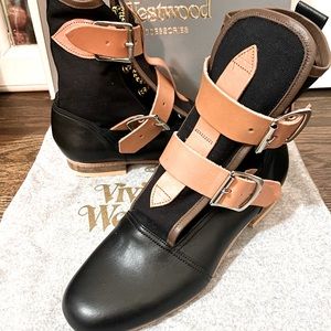 Vivienne Westwood lace up boots with double buckle straps in Black w/ Tan accent